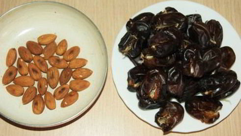 натуральные конфеты финики с миндалем в шоколаде