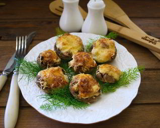 Начиненные грибы в духовке