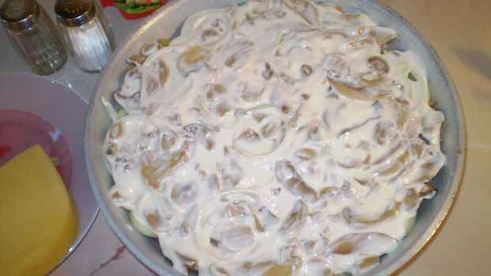 свинина, запеченная с грибами и сыром