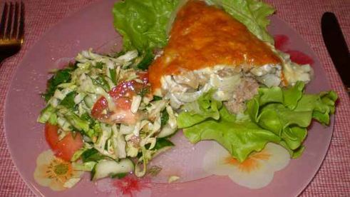 свинина, запеченная с грибами и сыром