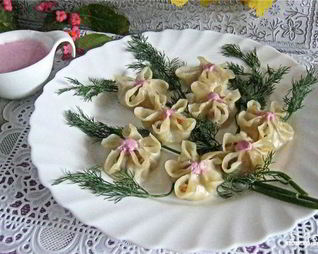 Пельмени со свининой и капустой