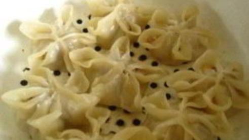 пельмени со свининой и капустой