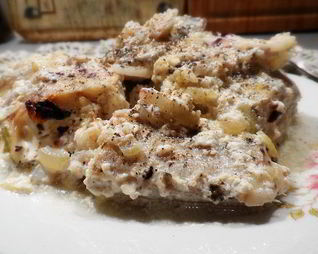 Минтай тушеный в сметане