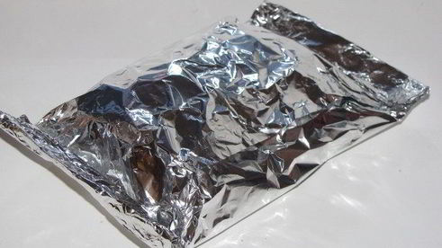 палтус с овощами, запеченный в фольге